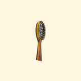 Petite brosse à cheveux pneumatique avec poils de sanglier et picots en nylon